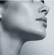 Black and white profile of a face and neck