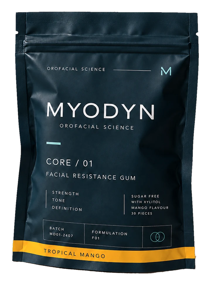 MYODYN CORE / 01 navy pouch, front, with the Tropical Mango flavour strip. Grade 2.